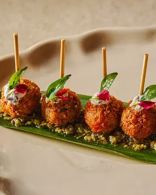 Chicken Koliwada - Fried chicken served with kokum yoghurt dip