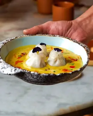 Meen Moilee Dimsum - River sole in coconut milk with fermented chili oil